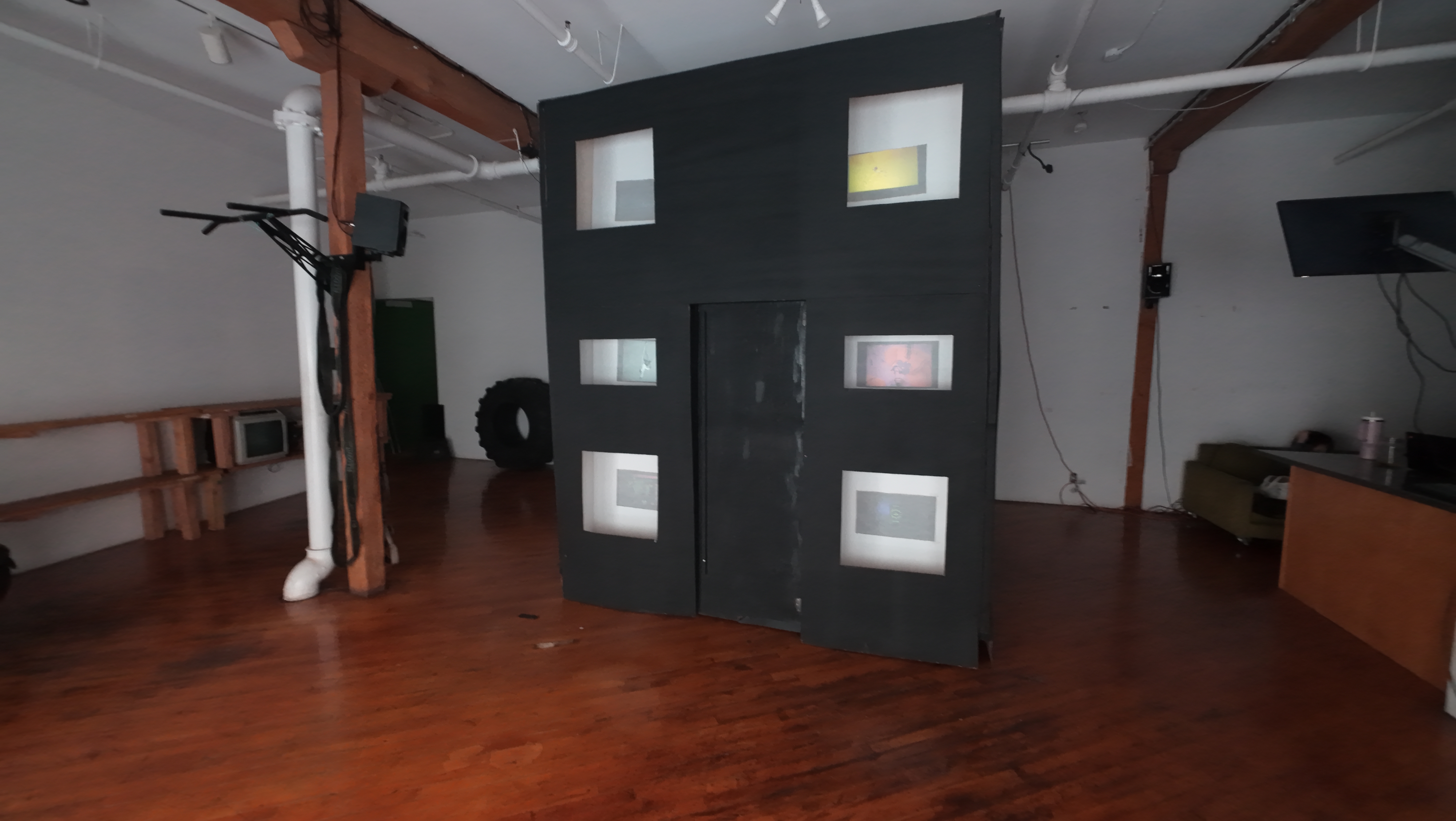 Doll House structure with glowing windows
